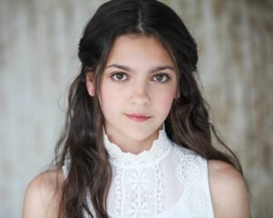  About Emily Carey